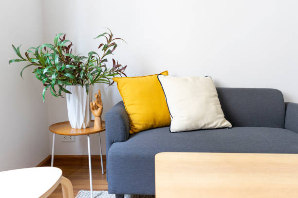 istock Scandinavian home. Room decor with yellow and white pillow. 1455232239