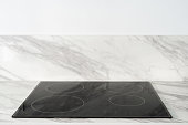 black induction stove for cooking at modern kitchen
