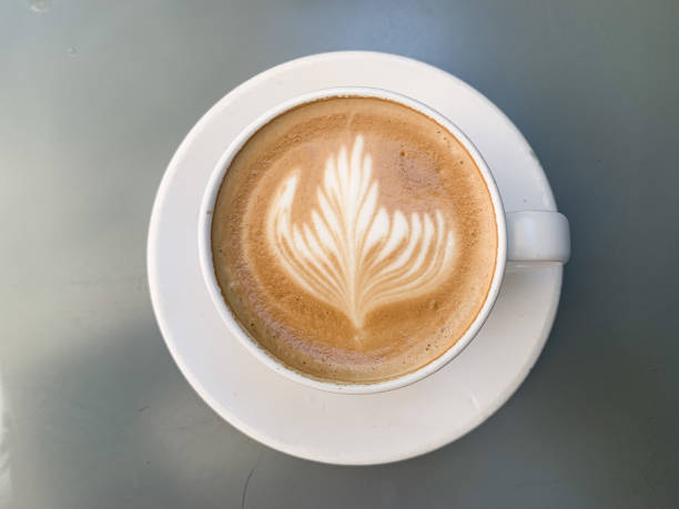 istock A cup of coffee latte on a grey table 1455234120