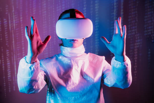 istock Metaverse concept. Woman in holographic clothes and vr glasses on matrix code background, playing video games with virtual reality headset, trying to touch something with hand in pink blue colors. 1455237403