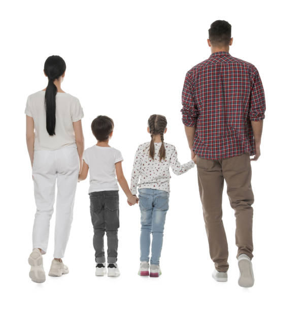 istock Children with their parents on white background, back view 1455239444
