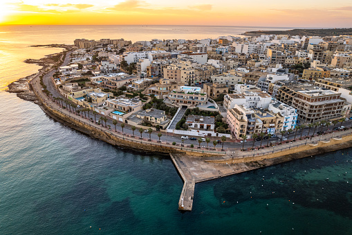 Marsaskala townscape at sunrise, Malta. Aerial drone view.