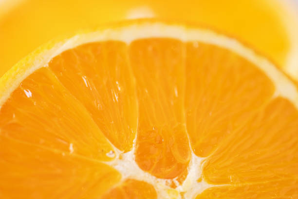istock Sliced orange close up. Food background 1455241228