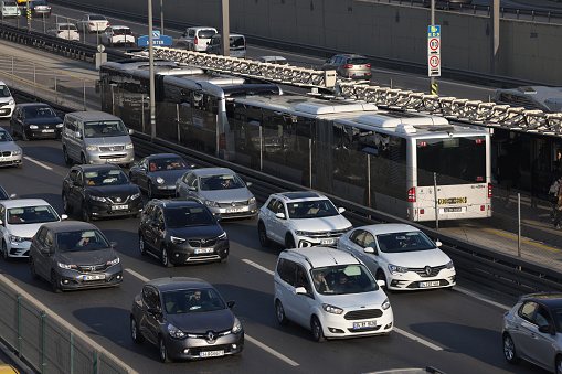 Istanbul, Merter, Turkey January 6,2023 Metrobus station and passengers at Merter with traffic jam