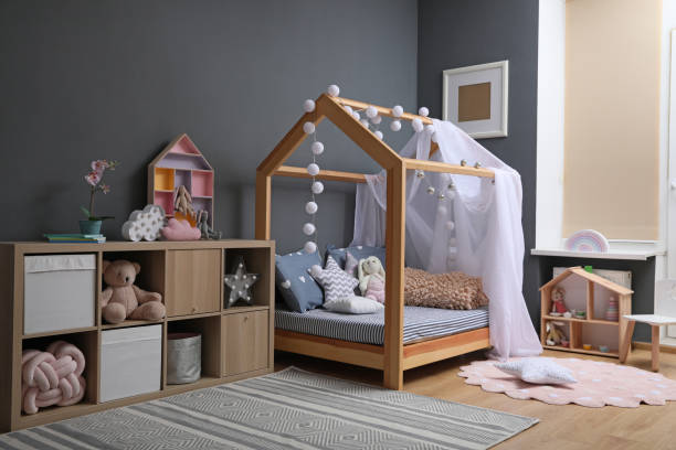 istock Stylish child room interior with comfortable bed 1455242671
