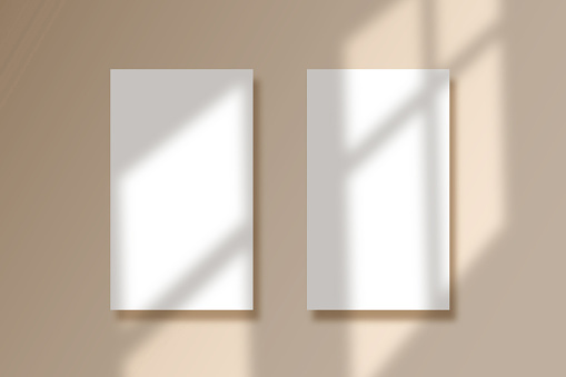 Shadow overlay effect template. Two poster paper hanging on wall. Mockup of overlay shadow from the window. Natural light shadow over the top