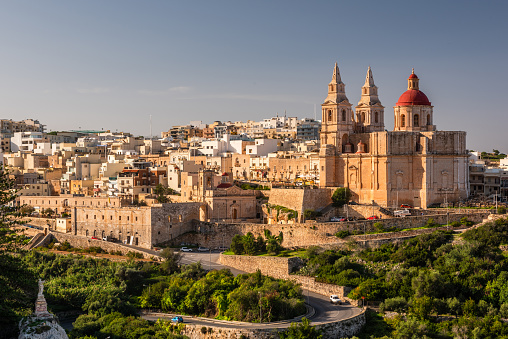 Il-Mellieha, Malta -  Mellieha town at sunny day with Paris Church on hill top.