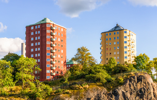 Located near to Stockholm's city centre, two apartment tower blocks on the horizon.