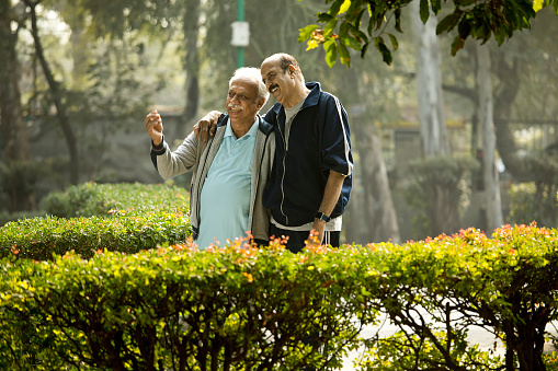 Two old men having fun at park