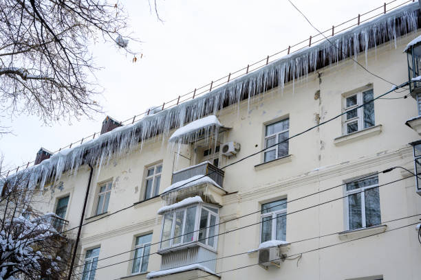 istock Close-up of icicles on the roof. 1455246850