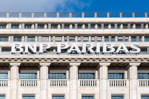Paris, France - January 8, 2023: Sign at the top of the BNP Paribas bank headquarters building located on boulevard des Italiens in Paris