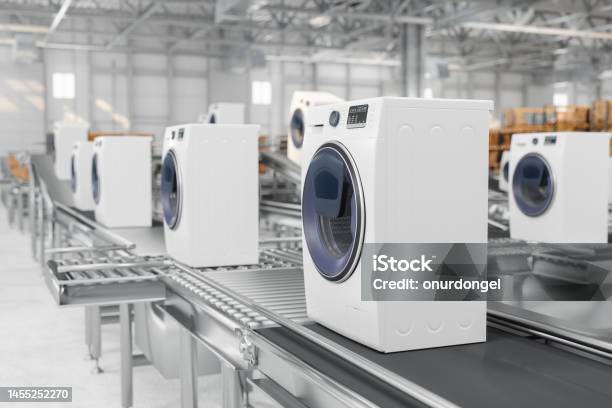Closeup View Of Washing Machines On Conveyor Belt In Warehouse Stock Photo - Download Image Now
