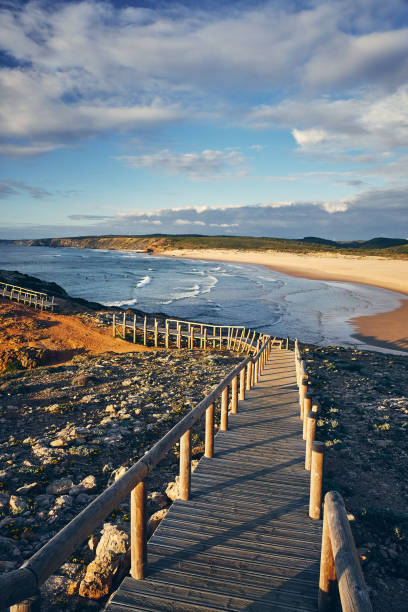 istock Praia da Bordeira and boardwalks forming part 1455253120