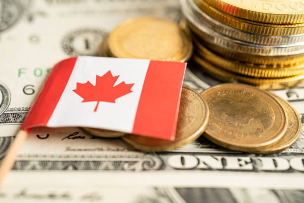 istock Stack of coins money with Canada flag, finance banking concept. 1455253716