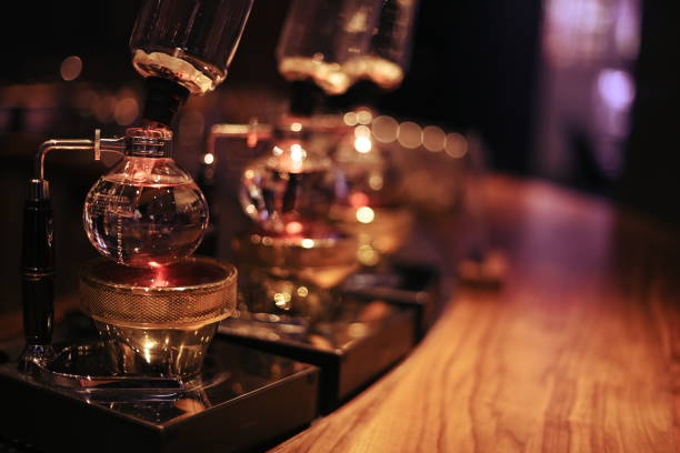 istock Selective focus shot of syphon coffee makers at the cafe bar 1455255233