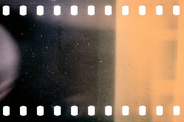 Photo of Dusty and grungy 35mm film texture or surface