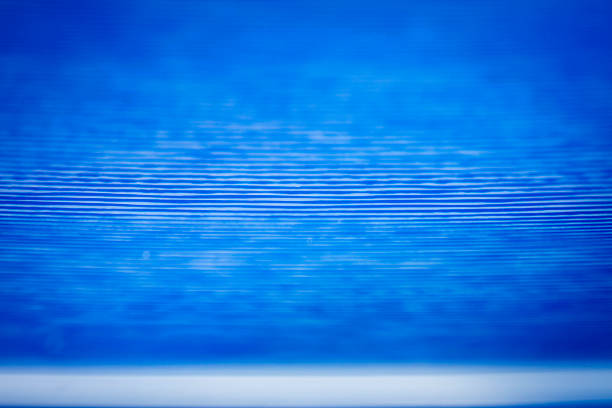 Macro shot of blue color vinyl record. Surface of an old vinyl record. Shallow deph of field.
