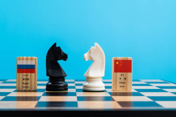 istock Chessboard with Chinese and Russian flags 1455261104