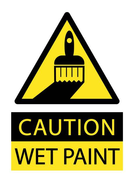 uwaga, mokra farba. żółty trójkątny znak pędzla . tekst poniżej. - wet paint stock illustrations