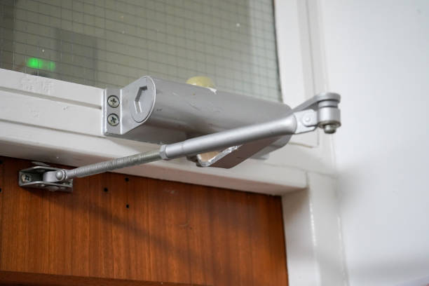 istock Close up of an automatic door closer 1455263080