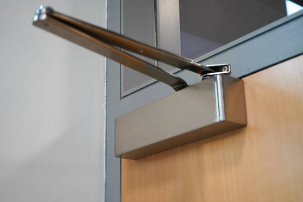 istock Close up of an automatic door closer 1455263098