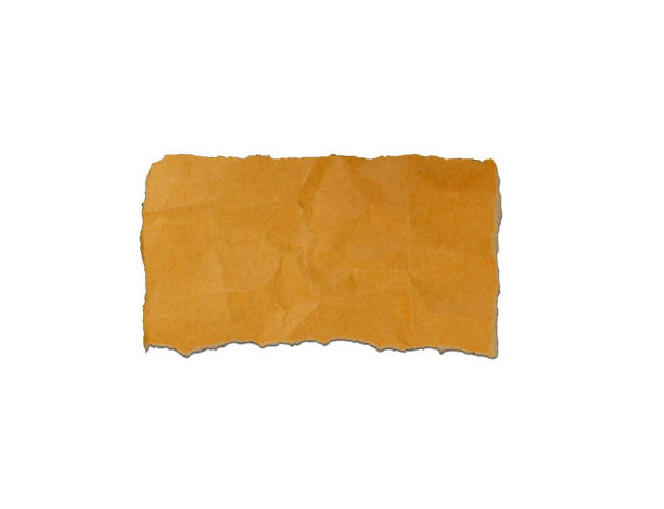 istock Torn, crumpled, brown paper on white background. 1455263527