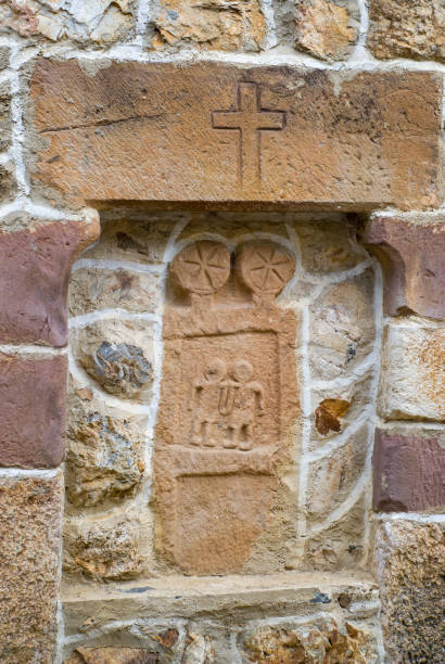 istock Old tombstone with salmon or pink colors 1455265496
