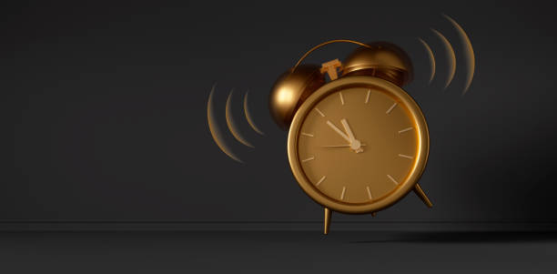 istock Golden vintage alarm clock 1455266338
