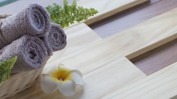 istock Beautiful spa composition on massage table , spa relax concept, copy space, beautiful spa set on wood table 1455270248