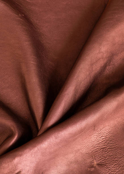 Natural brown leather. Raw material for manufacture of bags, shoes, clothing and accessories. stock photo