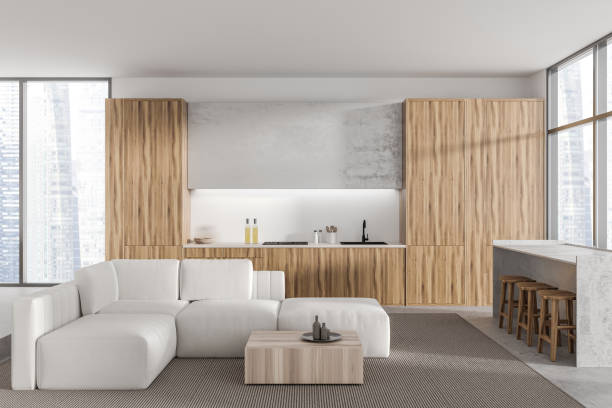 istock Stylish studio interior with cooking and relaxing area, panoramic window 1455274299