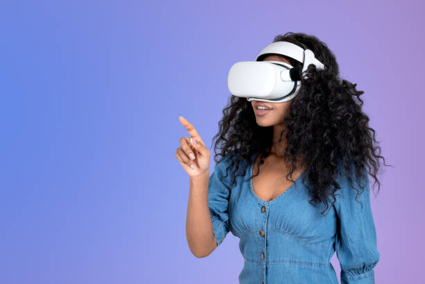 istock Black woman working in vr glasses, finger touching on copy space background 1455275263