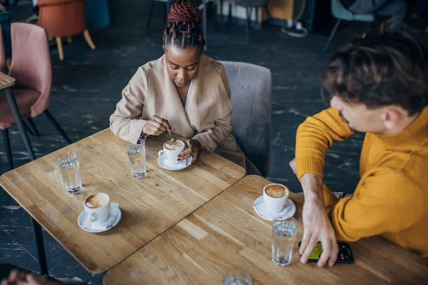istock Friends in coffee shop 1455276976