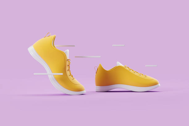 istock Yellow sneakers moving on purple background 1455277106