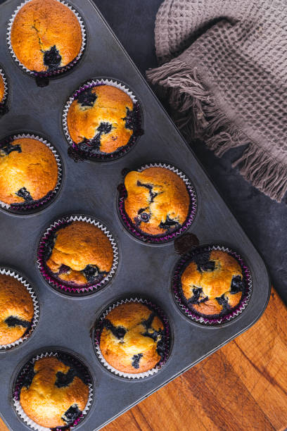 istock Homemade blueberry muffins in baking mold 1455279431