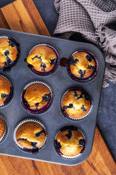 istock Homemade blueberry muffins in baking mold 1455279454