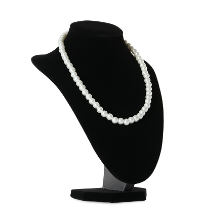 As classic as ever, the single strand of pearls with matching earrings.  Earrings have a tiny diamond for an added touch. Earrings have stud backs.