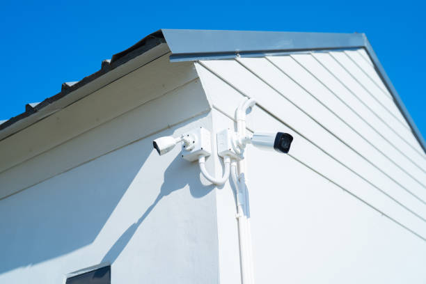istock CCTV security camera or closed circuit television at building exit way at home or house. Digital safety and motion recorder. Video surveillance. Technology monitor. 1455288665
