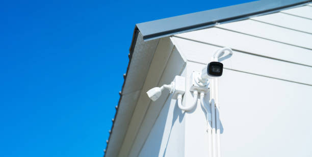 istock CCTV security camera or closed circuit television at building exit way at home or house. Digital safety and motion recorder. Video surveillance. Technology monitor. 1455288666