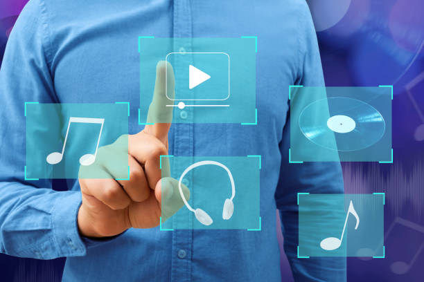 istock A young man on a virtual screen chooses leisure. Digital technology online entertainment. 1455289056