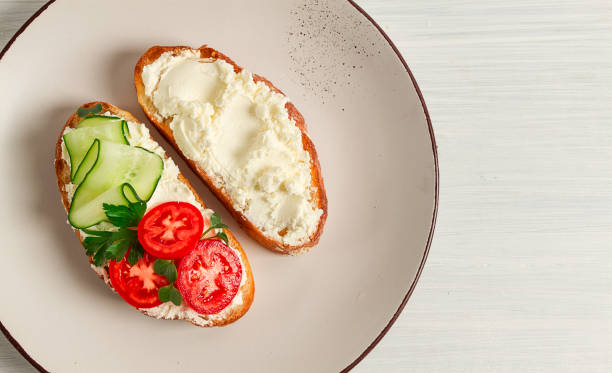 istock Sandwich, with cream cheese, homemade, on a cutting board, rustic style, no people, selective focus, breakfast 1455291104