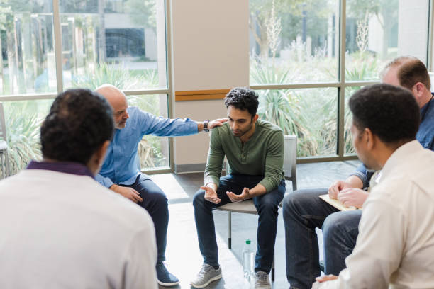 istock Mature man consoles his friend 1455291151