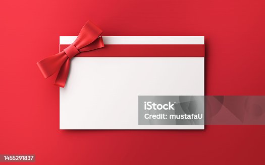 istock Gift Cards With Red Colored Bow on red background stock photo 1455291837