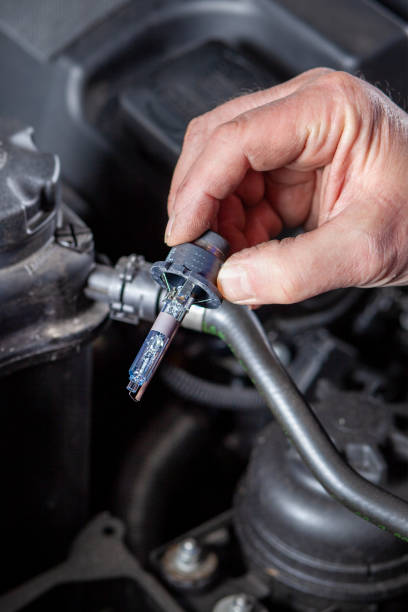 istock A mechanic is holding a bi-xenon headlamp 1455292398