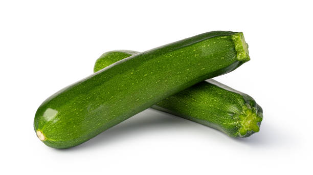 istock fresh green zucchini on white background 1455292767