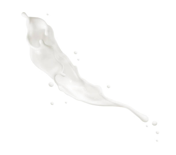 istock Milk splashes and drops in the air isolated on a white background 1455294341