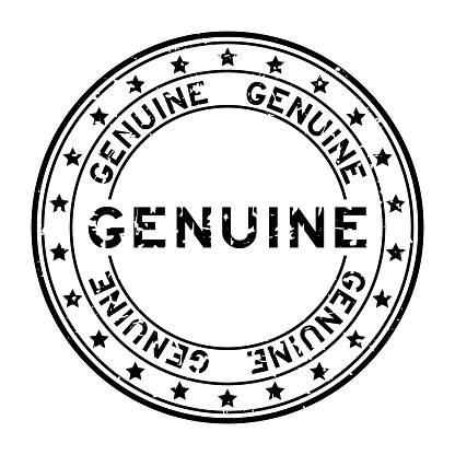 Grunge black genuine word round rubber seal stamp on white background
