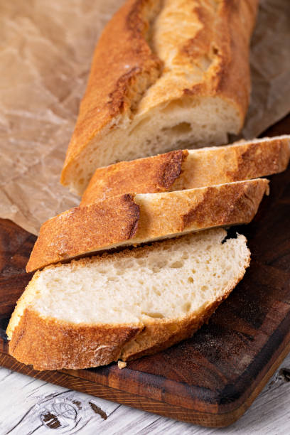 istock baked bread on wooden table 1455298134