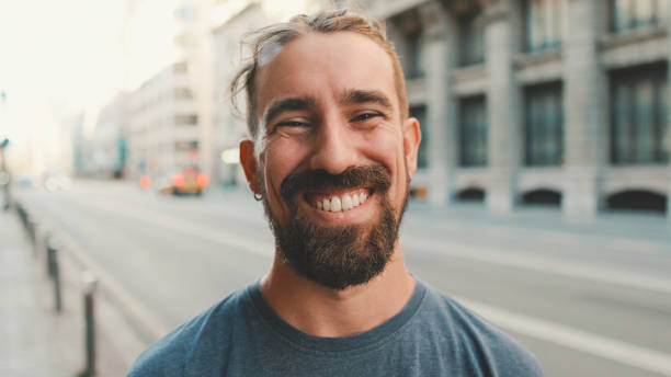 istock Close-up of young man with beard looking at the camera 1455299919