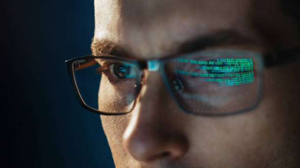 istock Close-up portrait of focused software engineer wearing eyeglasses 1455301012